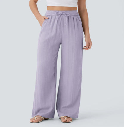 Pantalones anchos y fluidos de cintura alta para mujer