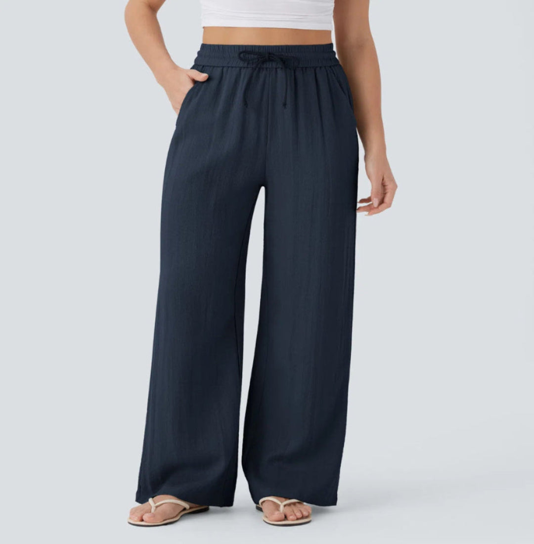 Pantalones anchos y fluidos de cintura alta para mujer