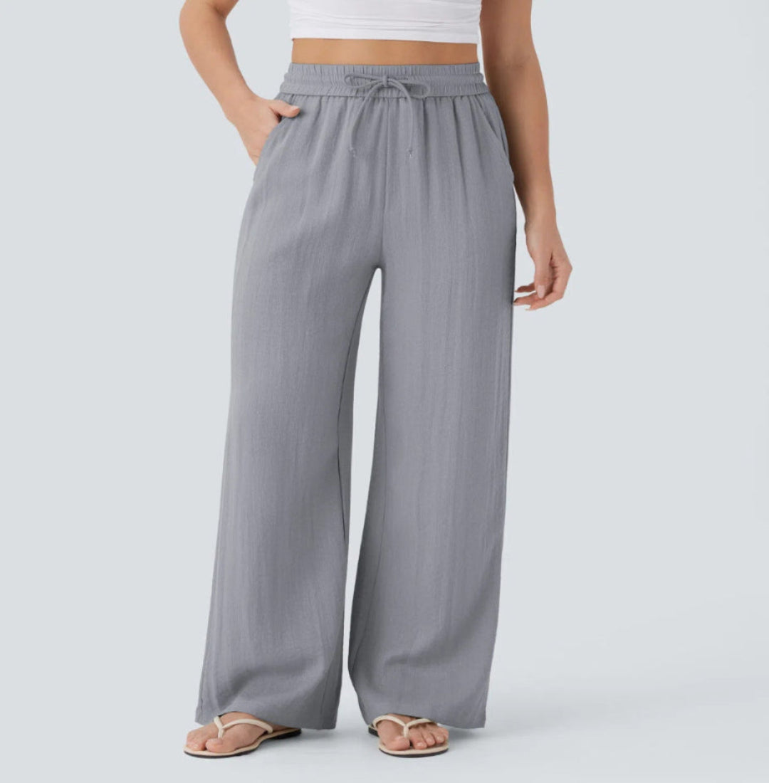 Pantalones anchos y fluidos de cintura alta para mujer