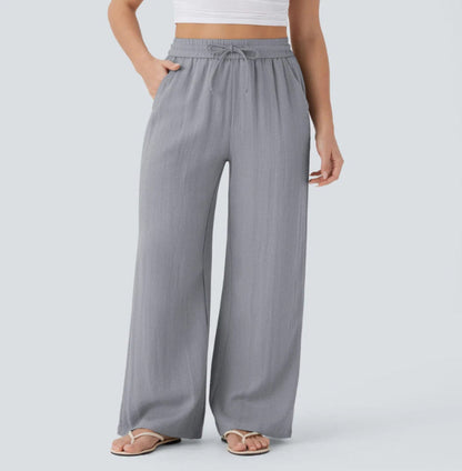 Pantalones anchos y fluidos de cintura alta para mujer