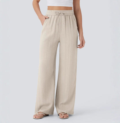 Pantalones anchos y fluidos de cintura alta para mujer