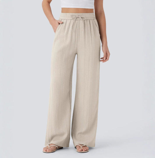Pantalones anchos y fluidos de cintura alta para mujer