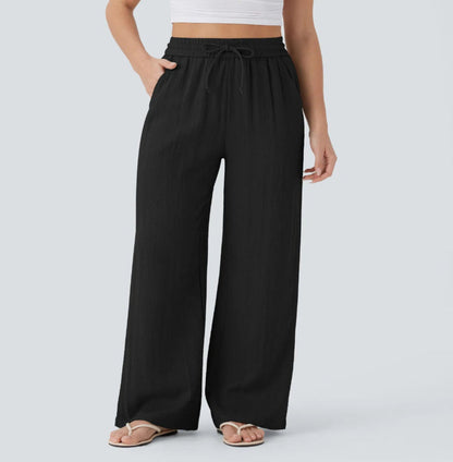Pantalones anchos y fluidos de cintura alta para mujer